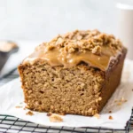 Moist cookie butter banana bread loaf with swirls of creamy speculoos spread
