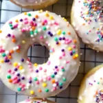 Colorful Funfetti Birthday Cake Donuts with vanilla glaze and rainbow sprinkles Funfetti Birthday Cake Donuts