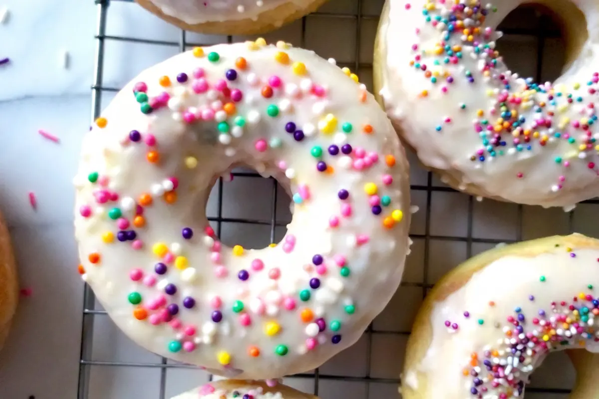 Colorful Funfetti Birthday Cake Donuts with vanilla glaze and rainbow sprinkles Funfetti Birthday Cake Donuts