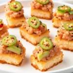 Spicy tuna crispy rice appetizer with jalapeño and avocado