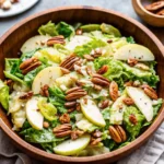 Brussels sprout salad with pears and pecans in maple-Dijon vinaigrette
