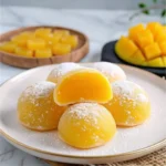 Golden Mango Mochi with glossy chewy skin and mango center