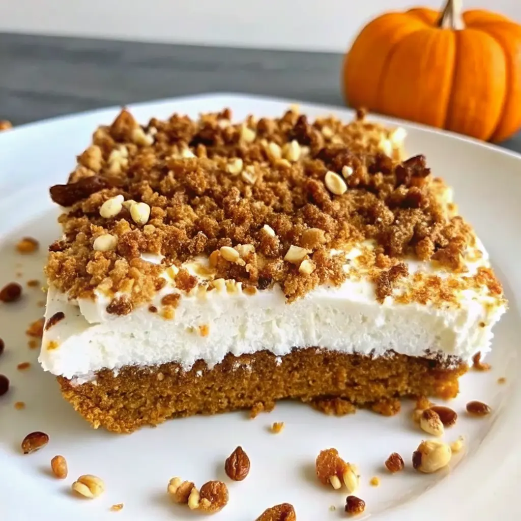 Pumpkin spice poke cake with caramel drizzle