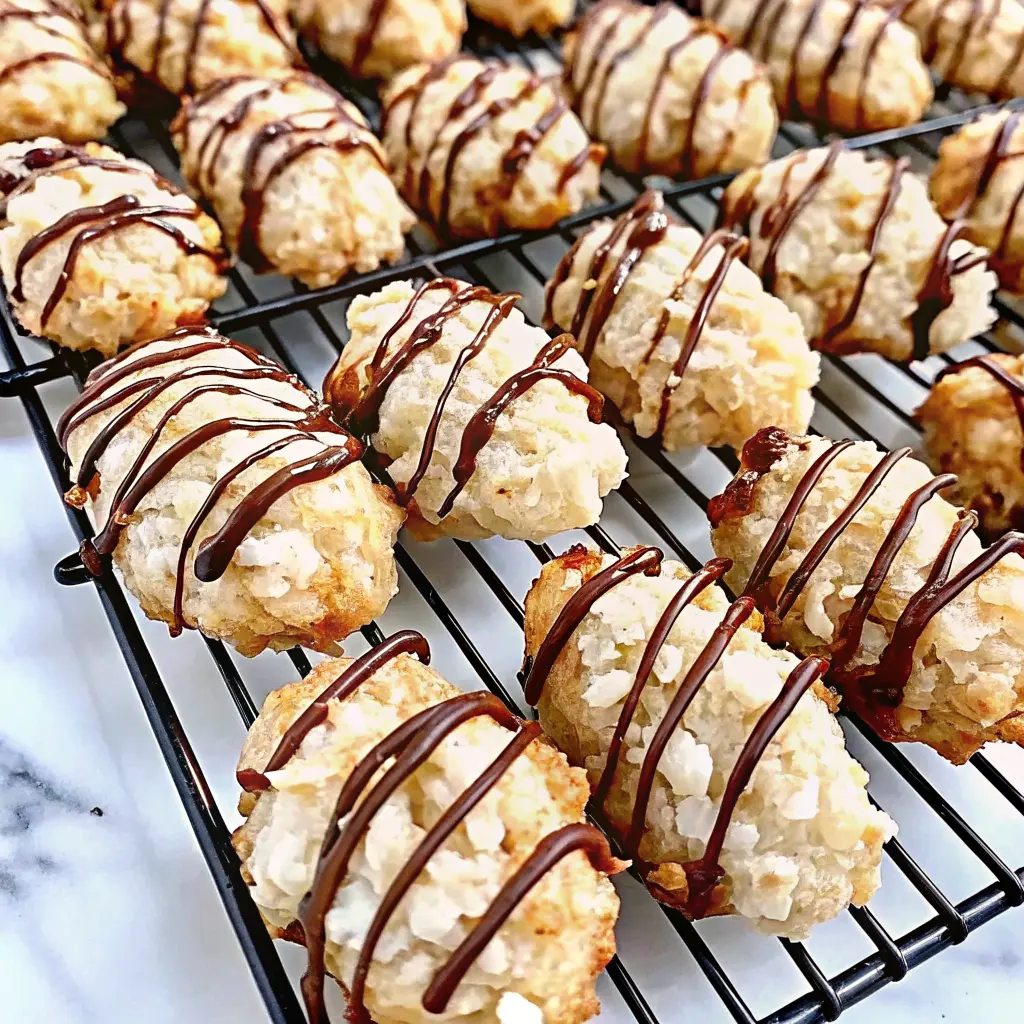 Chewy coconut almond macaroons on a parchment-lined baking tray
