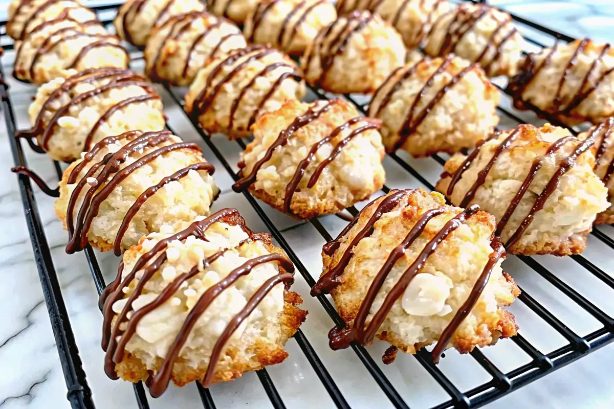 Chewy coconut almond macaroons on a parchment-lined baking tray