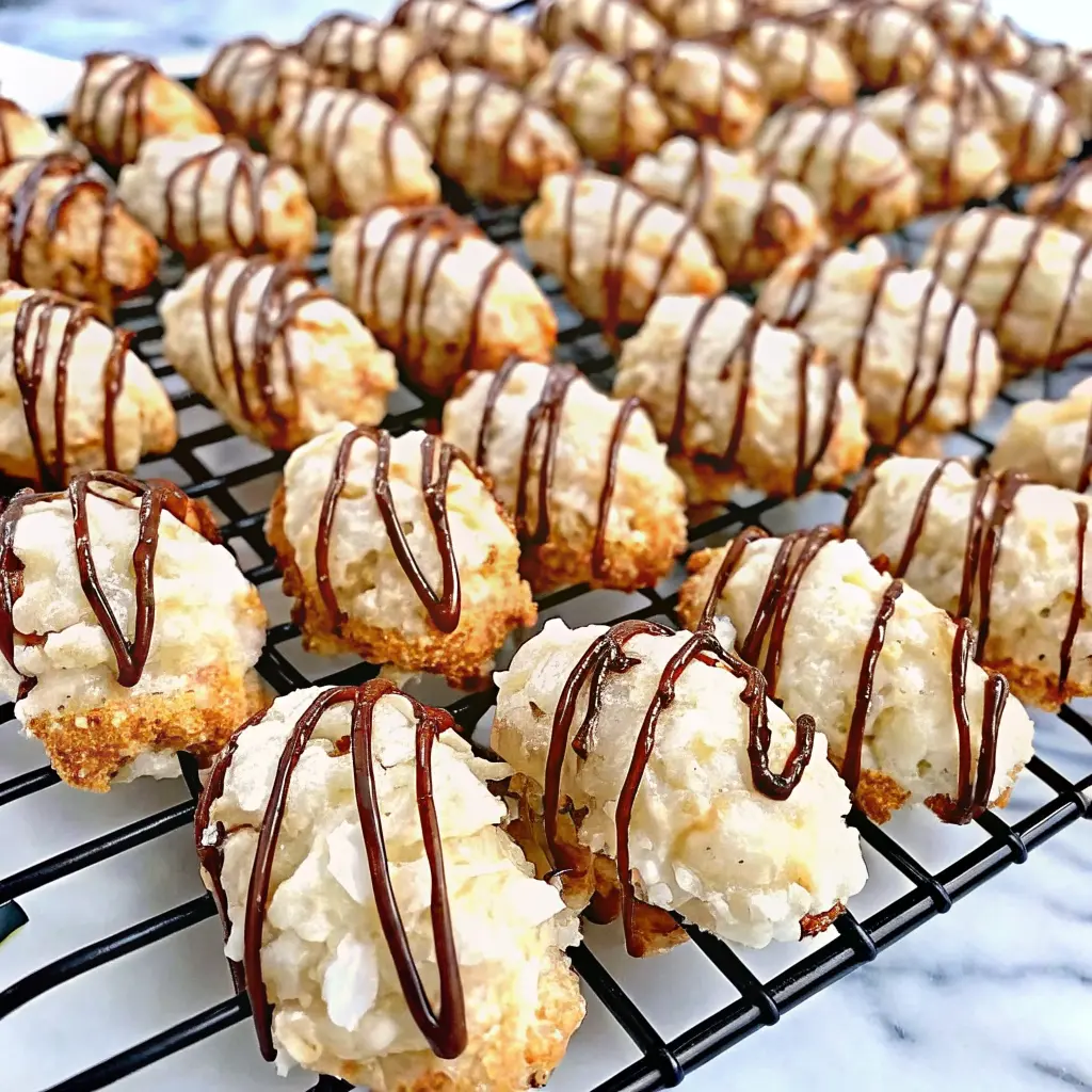 Chewy coconut almond macaroons on a parchment-lined baking tray