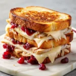 Turkey Grilled Cheese with Cranberry Recipe, sauce and melted cheese