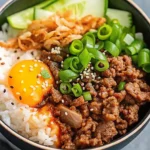 Korean Beef Rice Bowl with saucy beef, rice and colorful toppings in a bowl