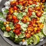 Roasted cauliflower shawarma bowls with chickpeas, fresh veggies and tahini drizzle