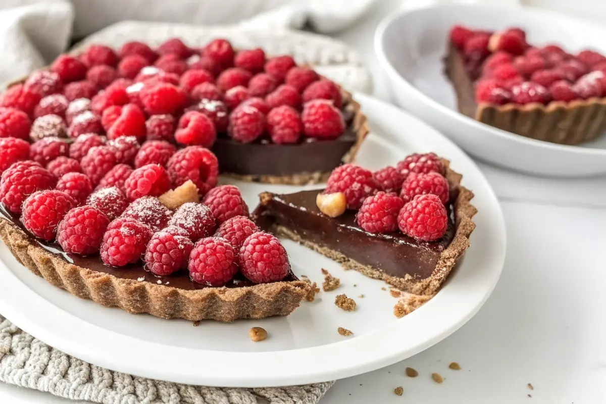 No-bake chocolate raspberry tart Recipe with ganache and fresh raspberries