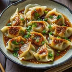 Oven-baked dumplings with peanut sauce in a one-pan casserole dish