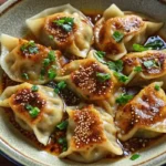 Oven-baked dumplings with peanut sauce in a one-pan casserole dish