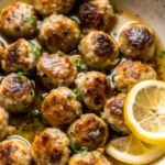 Lemon Garlic Chicken Meatballs with Caper Sauce in skillet