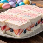 Easter fruit fluff dessert in a bowl with pastel toppings