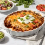 Taco rice casserole recipe with melted cheese on top
