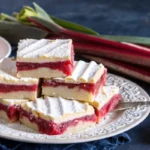 Rhubarb bars with cream cheese on a plate