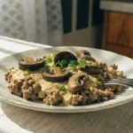 Hamburger Meat Stroganoff Recipe with ground beef, mushrooms, and creamy sauce served over egg noodles