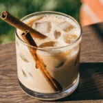 Iced Cinnamon Honey Latte served over ice with cinnamon and honey.