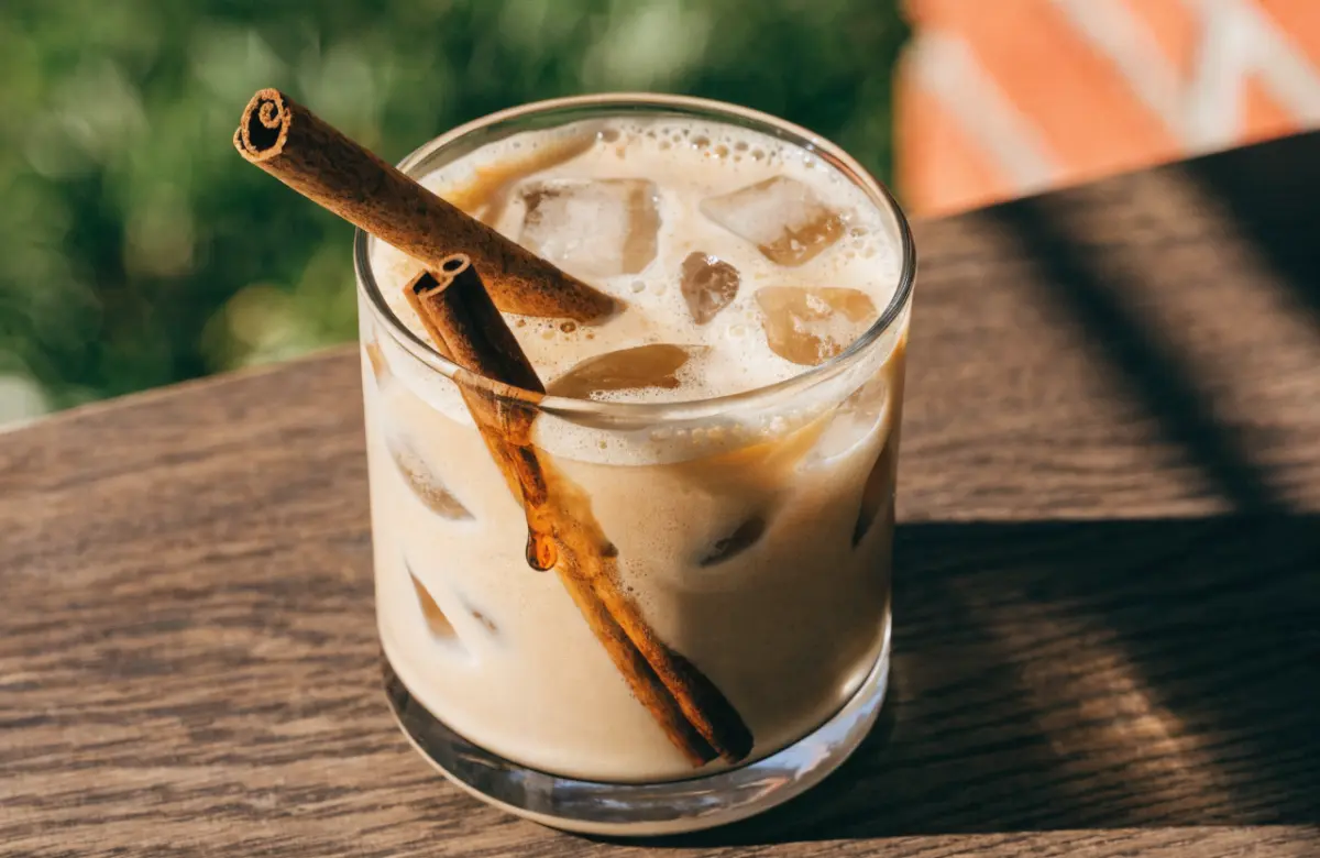 Iced Cinnamon Honey Latte served over ice with cinnamon and honey.