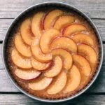 Fresh Nectarine Upside-Down Cake with caramelized nectarines on a buttery vanilla cake