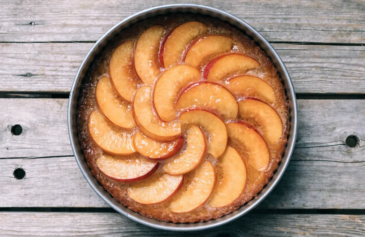Fresh Nectarine Upside-Down Cake with caramelized nectarines on a buttery vanilla cake