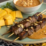 Beef Satay with Spicy Peanut Sauce, Mango & Peanut Garnish