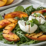 Grilled peach and burrata salad with basil