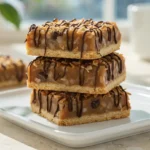 Samoa Cookie Bars Recipe with caramel coconut and chocolate