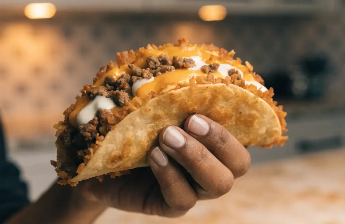 Homemade cheesy gordita crunch taco with beef and cheese