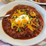 Roasty Toasty Bourbon Chili Recipe with ground beef, beans, and smoky peppers